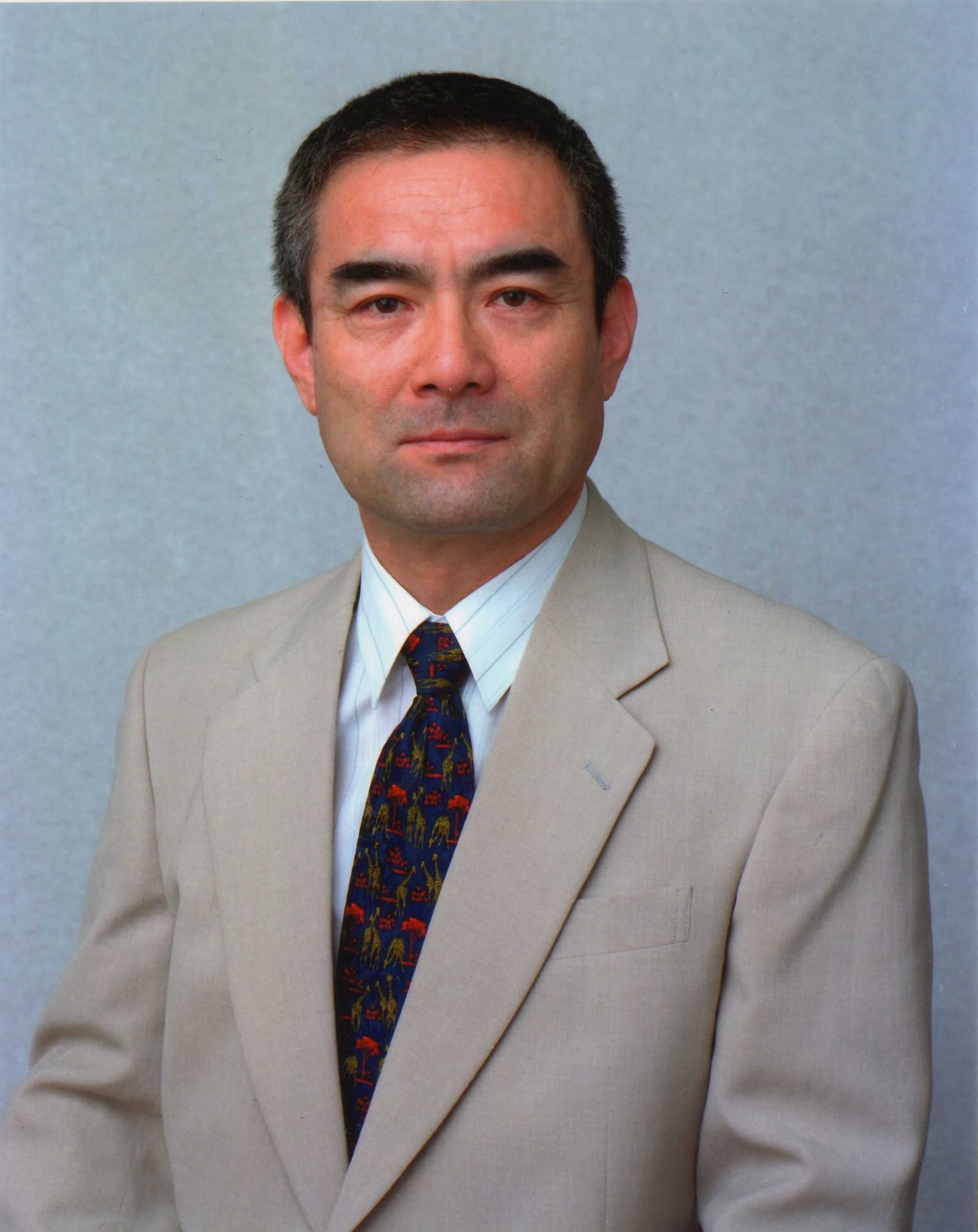 辻 萬 長